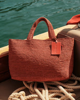 Borsa Sunset Media in Rafia |